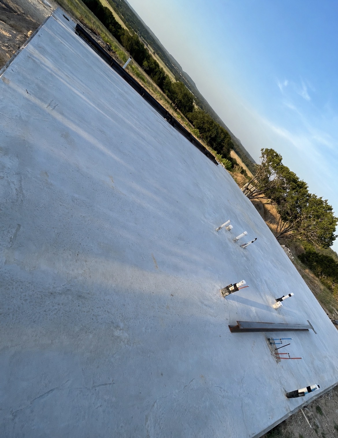 Concrete slab with PVC plumbing rough-ins by Martinez Construction