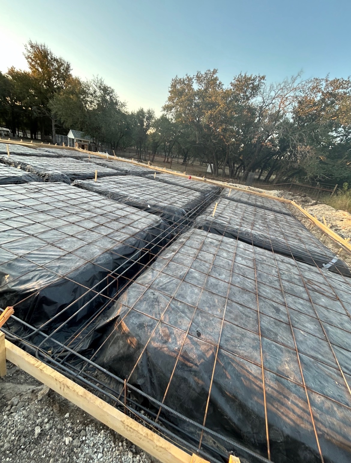 Concrete slab pouring under metal carport fresh pour concrete contractor Killeen TX Martinez Construction