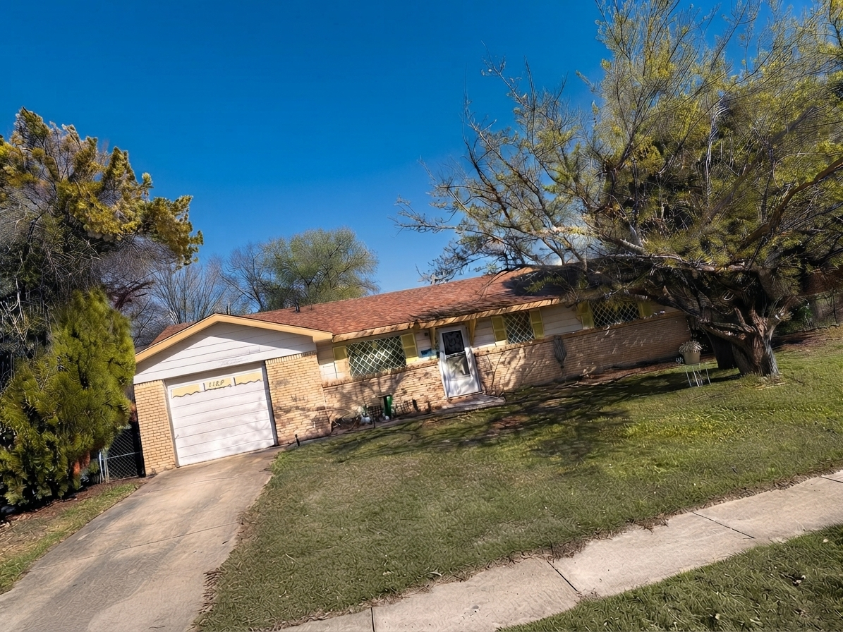 Ranch home brown shingle roof at 1148 in Gatesville TX roofing contractor Martinez Construction